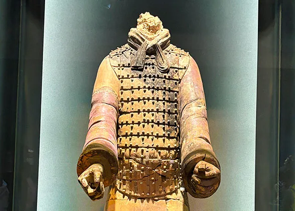 Terracotta Figure with Purple Sleeves