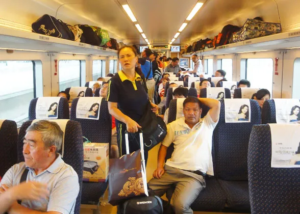 Second Class Carriage Crowded with Passengers