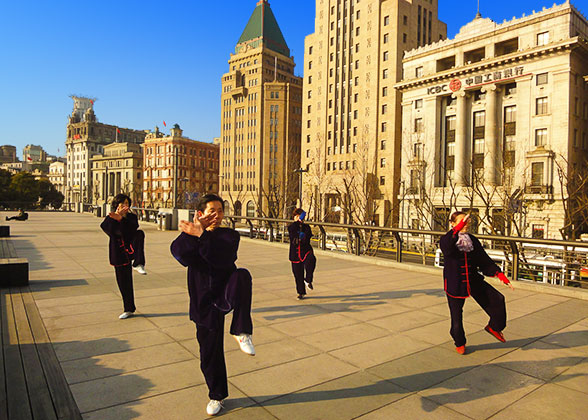 Locals Playing Tai Chi at the Bund Area
